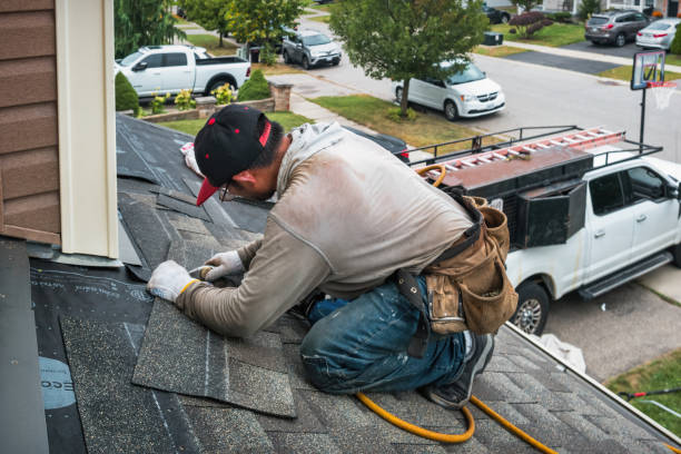 Professional Roofing technician working in Macomb, IL